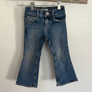 OshKosh 2 Toddler flared jeans, medium wash.